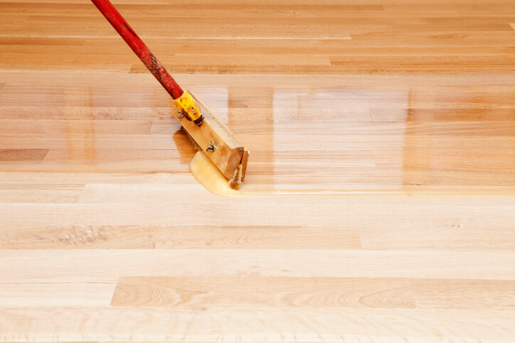 Wood floor refinishing by Premium Rug Cleaners